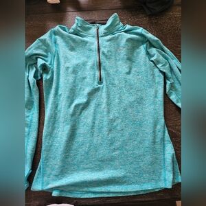 Tile running jacket by Nike. Size large